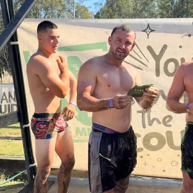Washing off after the mud run